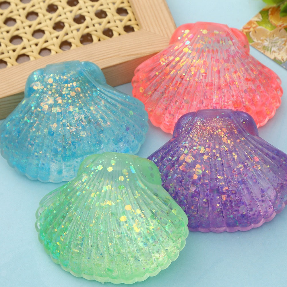 R1448  Glitter Shell Stress Relief Squish Ball Toy