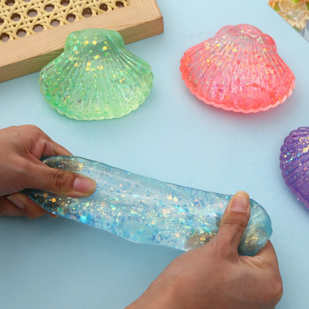 R1448  Glitter Shell Stress Relief Squish Ball Toy