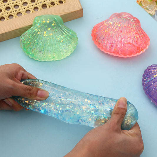 R1448  Glitter Shell Stress Relief Squish Ball Toy