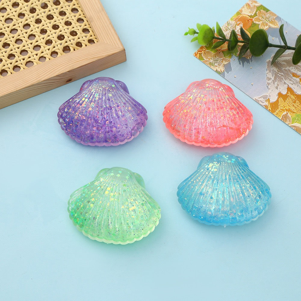 R1448  Glitter Shell Stress Relief Squish Ball Toy